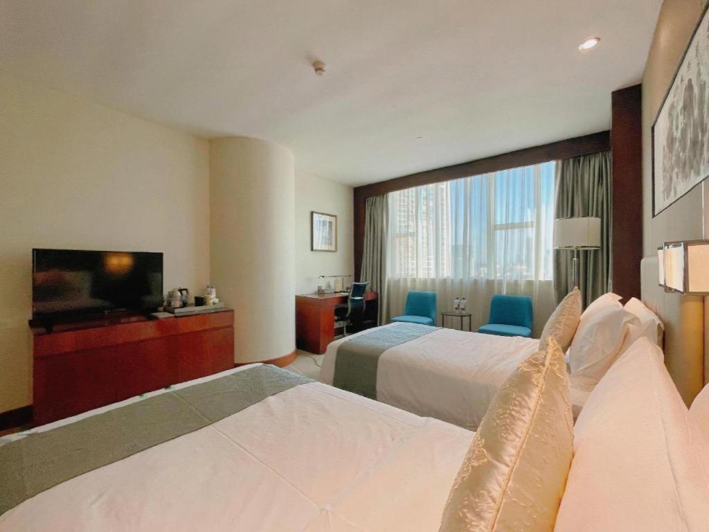 Grand Soluxe Zhongyou Hotel Shenzhen Exterior foto